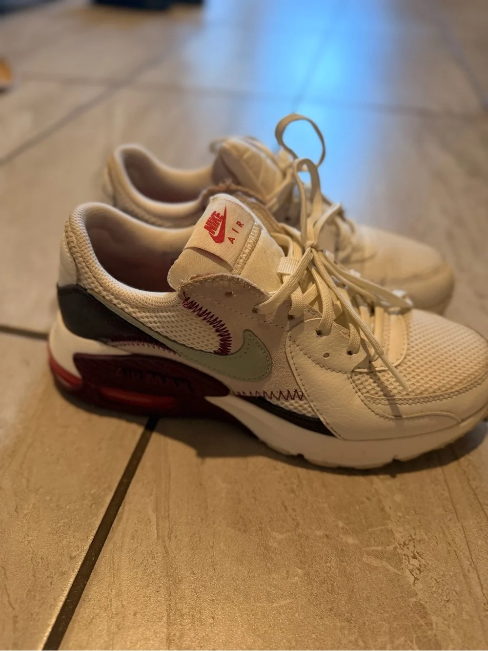 Nike White Sneakers with Mint Swoosh and Maroon Accents